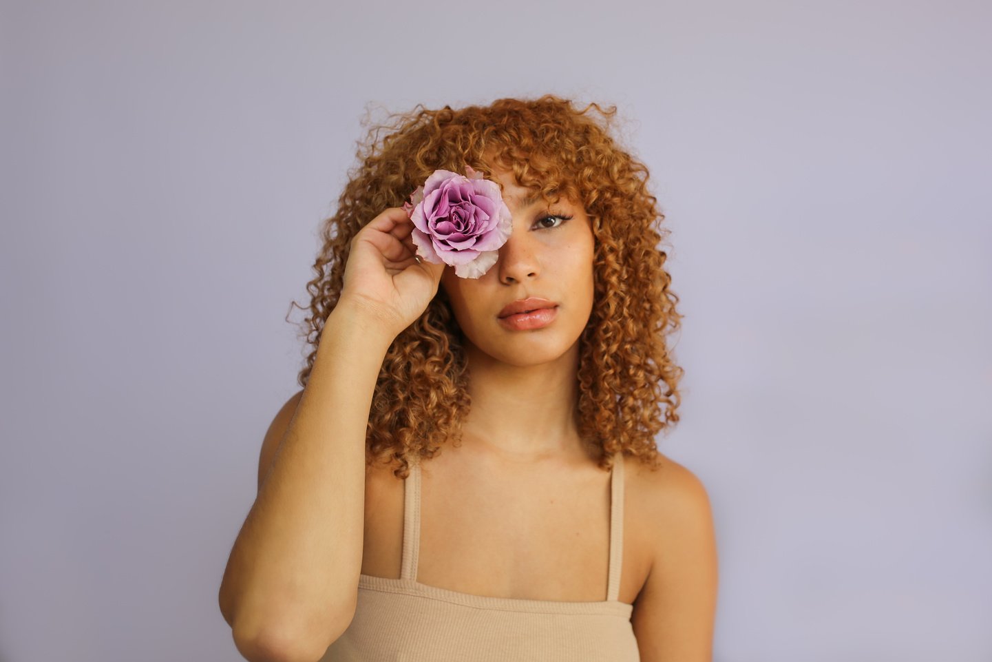 Portrait of a Woman with a Flower